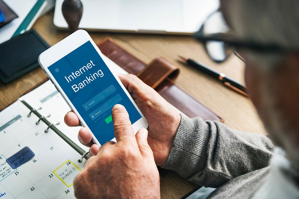 A customer signing in to internet banking on a smartphone